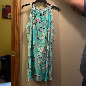 Very cute dress! Size medium but can fit large.